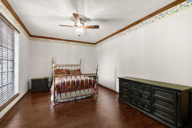 5 Hartwick Ct, Conroe, TX 77304 - bedroom with wood finished floors, a textured ceiling, ornamental molding, and a ceiling fan