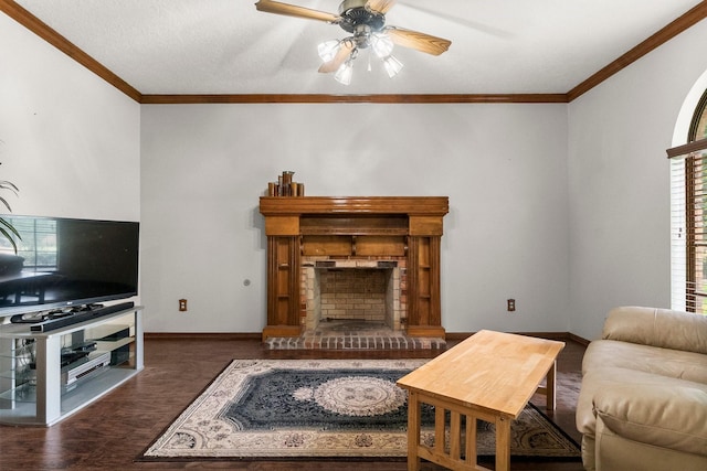 5 Hartwick Ct, Conroe, TX 77304 - living room with a ceiling fan, crown molding, wood finished floors, and a brick fireplace