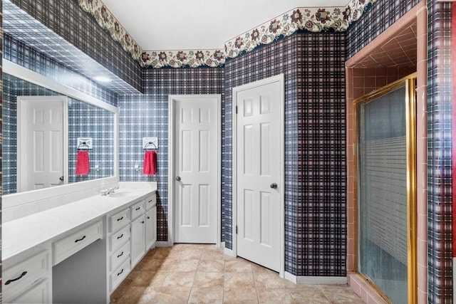 5 Hartwick Ct, Conroe, TX 77304 - full bathroom featuring wallpapered walls, vanity, tile patterned flooring, and a stall shower