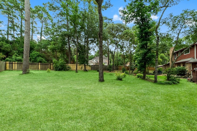 5 Hartwick Ct, Conroe, TX 77304 - view of yard with view of wooded area