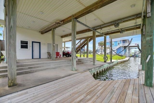 23002 Lunes St, Galveston, TX 77554 - dock with stairs and a water view