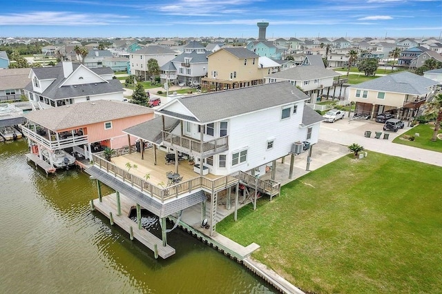 23002 Lunes St, Galveston, TX 77554 - aerial perspective of suburban area featuring a nearby body of water
