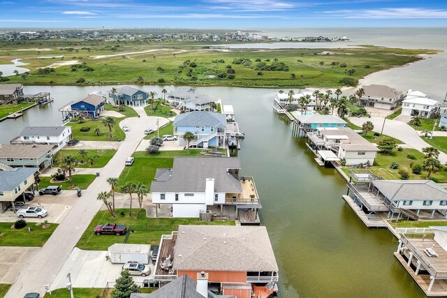 23002 Lunes St, Galveston, TX 77554 - aerial perspective of suburban area featuring a nearby body of water