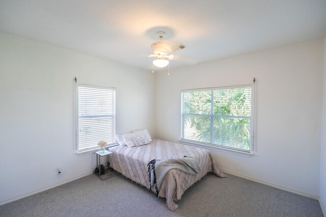23002 Lunes St, Galveston, TX 77554 - bedroom featuring light colored carpet