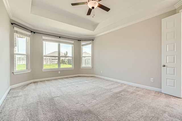 2008 Bristol Cliff Ln, Pearland, TX 77089 - carpeted spare room featuring a tray ceiling, ceiling fan, and ornamental molding