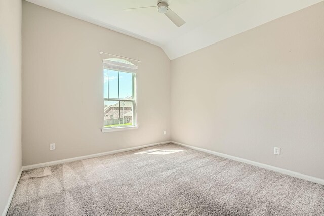 2008 Bristol Cliff Ln, Pearland, TX 77089 - empty room featuring a ceiling fan, carpet flooring, and vaulted ceiling