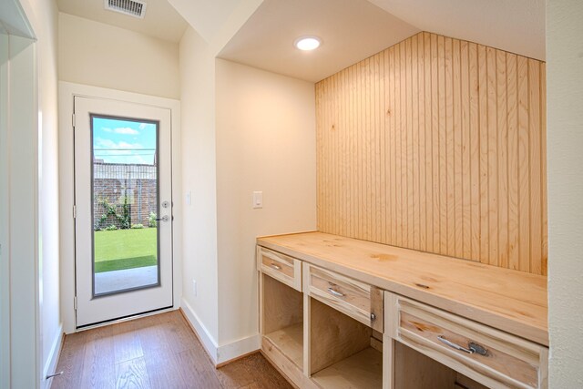 1716 Sedola Ln, Houston, TX 77055 - mudroom featuring wood finished floors, vaulted ceiling, and recessed lighting