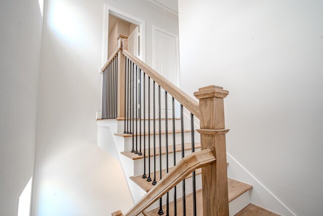 1716 Sedola Ln, Houston, TX 77055 - stairs featuring wood finished floors