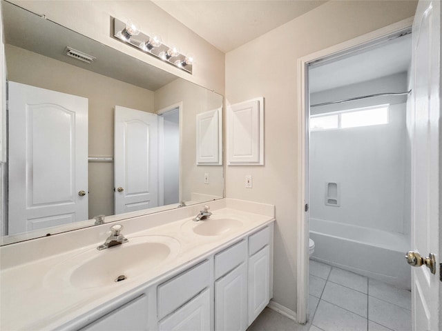 3106 Alexandros Ct, Pearland, TX 77584 - bathroom featuring double vanity, tile patterned floors, and washtub / shower combination