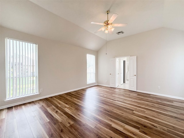 3106 Alexandros Ct, Pearland, TX 77584 - empty room with lofted ceiling, a ceiling fan, and wood finished floors