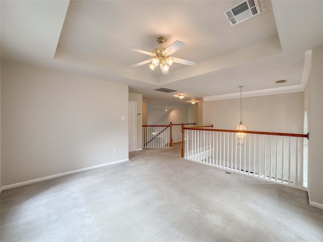 3106 Alexandros Ct, Pearland, TX 77584 - spare room featuring ceiling fan, a tray ceiling, and carpet