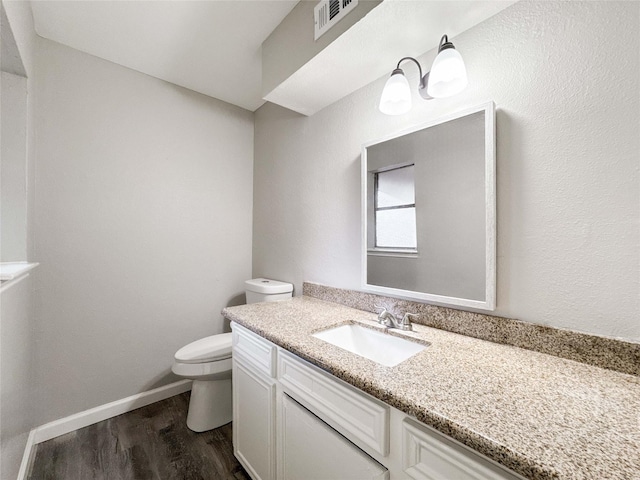 10610 Mills Prairie St, Houston, TX 77070 - half bathroom featuring wood finished floors and vanity