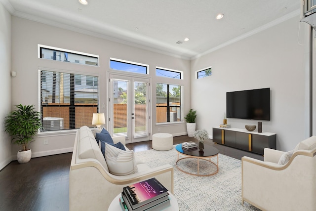 4611 Rose St, Houston, TX 77007 - living area with dark wood-style floors, recessed lighting, crown molding, and french doors