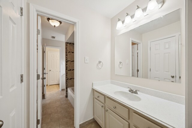 2537 La Rochelle Ct, Seabrook, TX 77586 - bathroom with vanity, tile patterned floors, and shower / bath combo