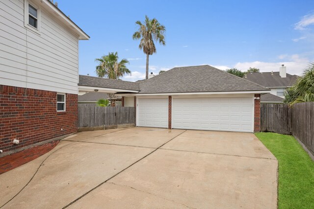 2537 La Rochelle Ct, Seabrook, TX 77586 - garage featuring concrete driveway