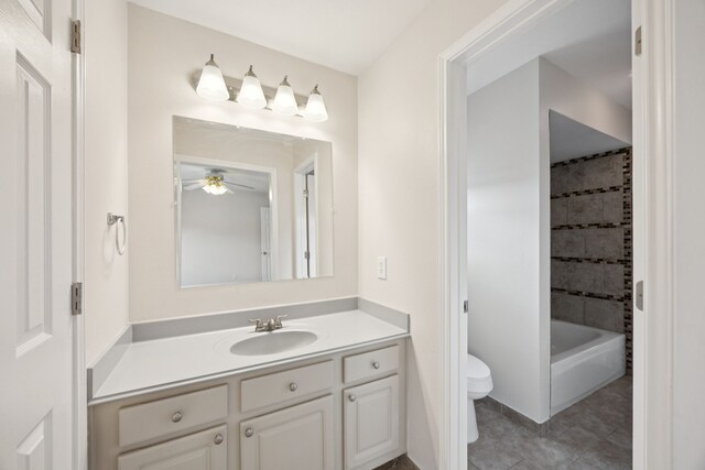 2537 La Rochelle Ct, Seabrook, TX 77586 - bathroom with vanity, a ceiling fan, and tile patterned floors