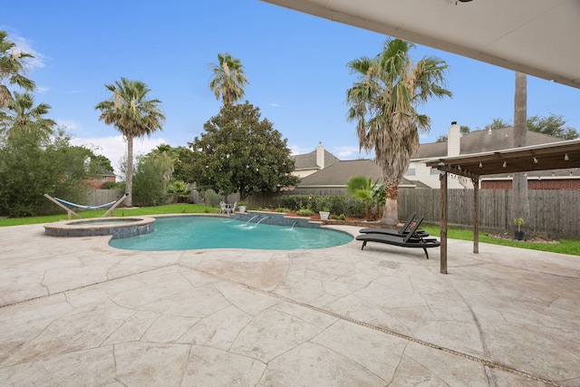 2537 La Rochelle Ct, Seabrook, TX 77586 - view of swimming pool featuring a patio area, a fenced backyard, and a pool with connected hot tub
