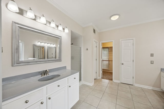2537 La Rochelle Ct, Seabrook, TX 77586 - bathroom with vanity, a shower stall, ornamental molding, tile patterned flooring, and a walk in closet