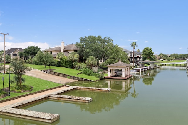 2537 La Rochelle Ct, Seabrook, TX 77586 - dock with a water view, a yard, and a residential view