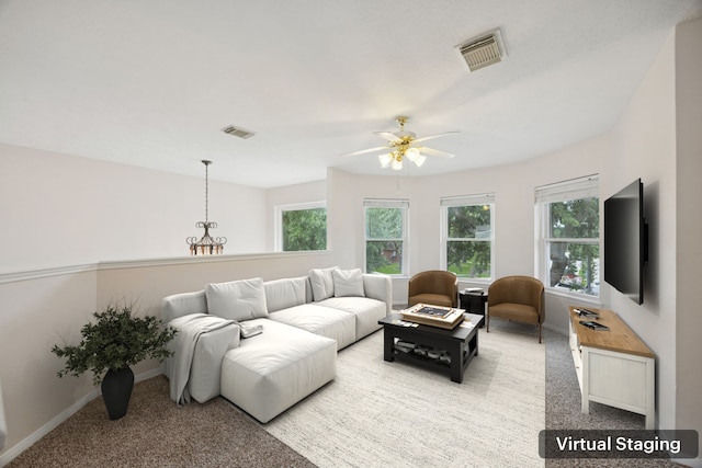 2537 La Rochelle Ct, Seabrook, TX 77586 - living room featuring light carpet and a ceiling fan