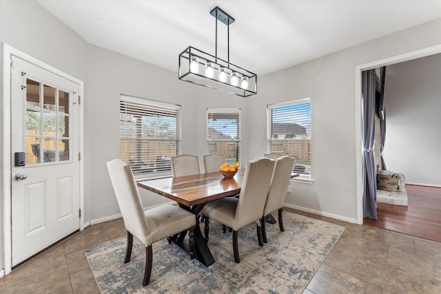 4318 Raintree Ct, Pasadena, TX 77505 - dining room featuring baseboards
