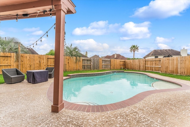 4318 Raintree Ct, Pasadena, TX 77505 - view of pool featuring a fenced backyard and a patio