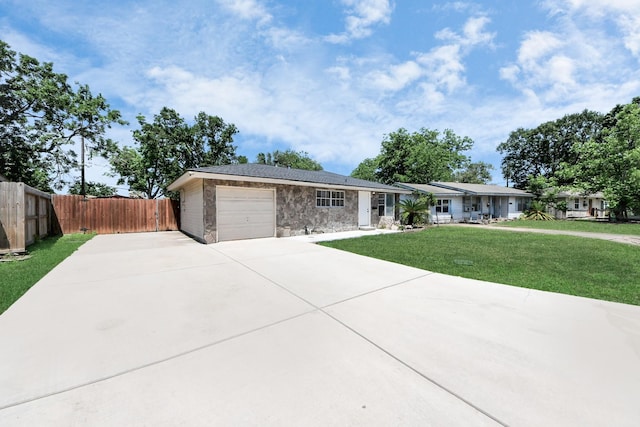 2811 Wentworth Ln, Pasadena, TX 77506 - ranch-style house with stone siding, driveway, and a garage