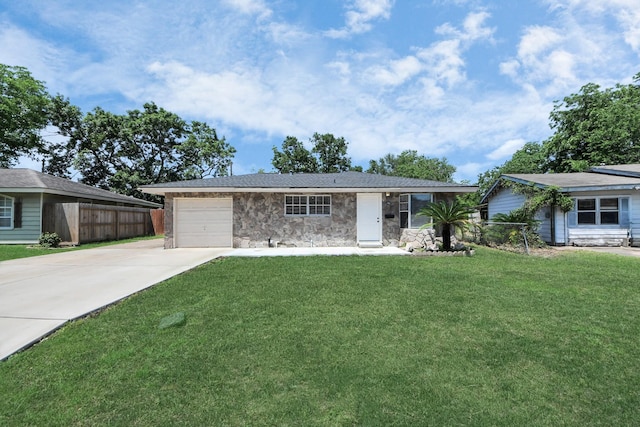 2811 Wentworth Ln, Pasadena, TX 77506 - ranch-style home featuring concrete driveway, a garage, and stone siding