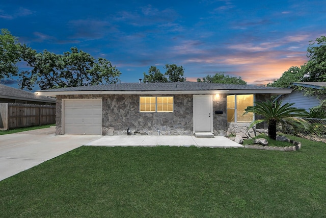2811 Wentworth Ln, Pasadena, TX 77506 - ranch-style house featuring concrete driveway, an attached garage, and stone siding