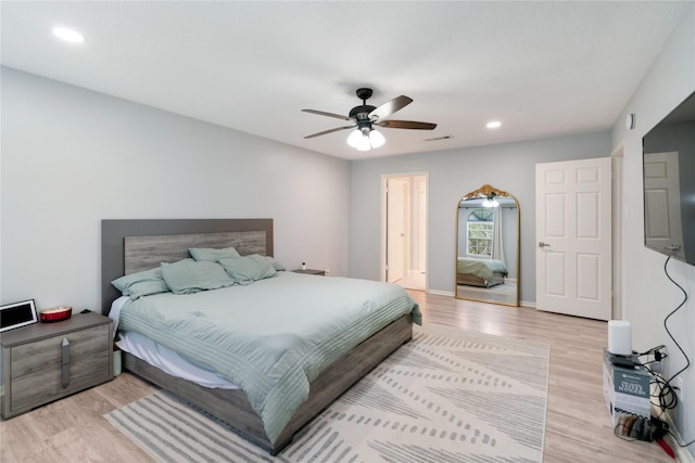 15514 Pebble Bend Dr, Houston, TX 77068 - bedroom with light wood finished floors, recessed lighting, and ceiling fan
