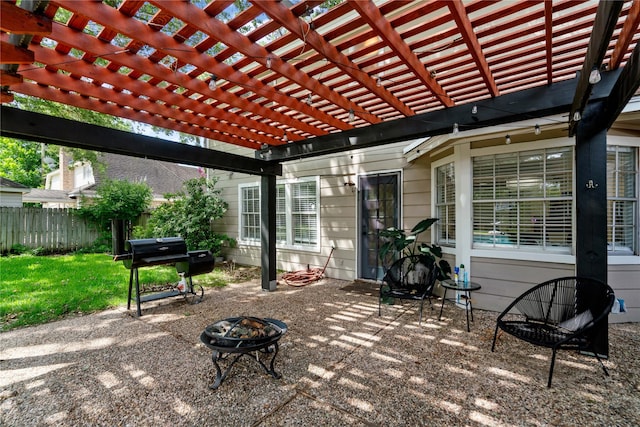 15514 Pebble Bend Dr, Houston, TX 77068 - view of patio / terrace with a fire pit and a grill