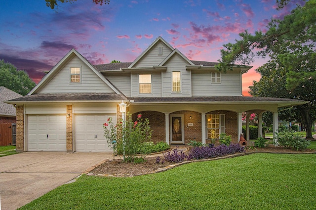 8806 Aberdeen Oaks Dr, Houston, TX 77095 - traditional-style house featuring a front yard, brick siding, concrete driveway, and a porch