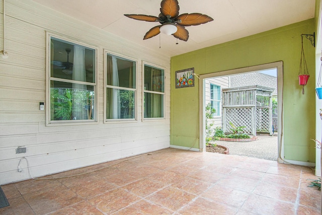 8806 Aberdeen Oaks Dr, Houston, TX 77095 - unfurnished sunroom with ceiling fan