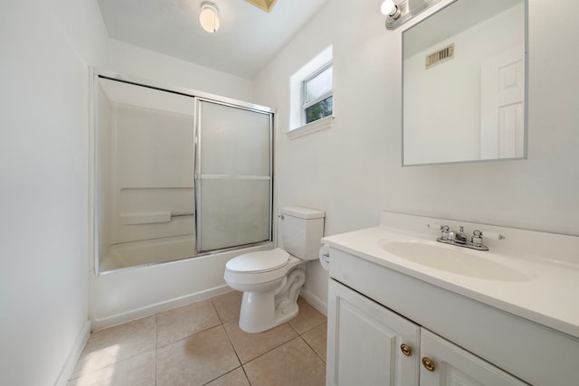 14527 Polo St, Houston, TX 77085 - bathroom featuring vanity, tile patterned floors, and combined bath / shower with glass door