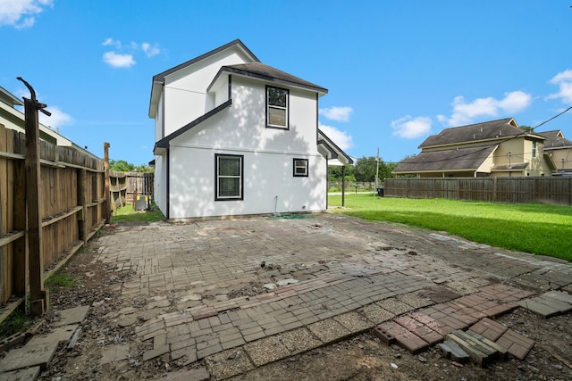 14527 Polo St, Houston, TX 77085 - rear view of property featuring a patio and a fenced backyard