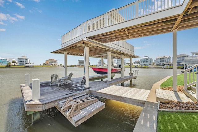 4107 Bluewing Teal Ct, Galveston, TX 77554 - dock area featuring a water view and boat lift