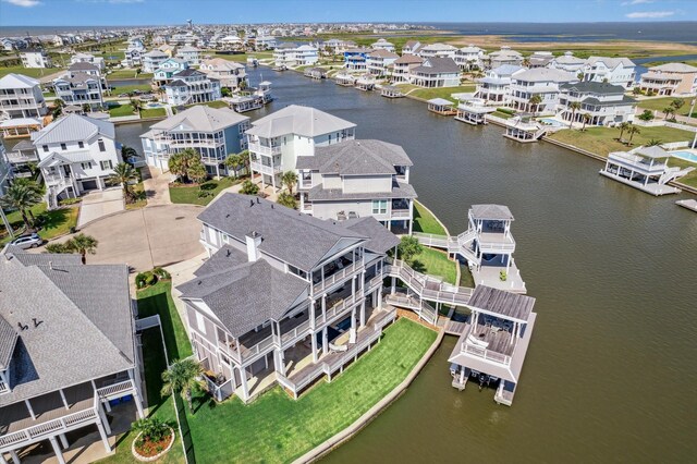 4107 Bluewing Teal Ct, Galveston, TX 77554 - aerial view of residential area with a large body of water
