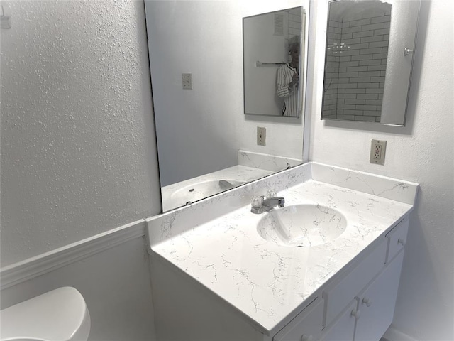 2824 S Bartell Dr, Houston, TX 77054 - bathroom with vanity and a textured wall