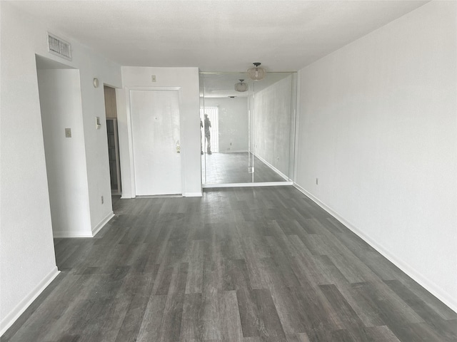 2824 S Bartell Dr, Houston, TX 77054 - spare room with dark wood finished floors and baseboards
