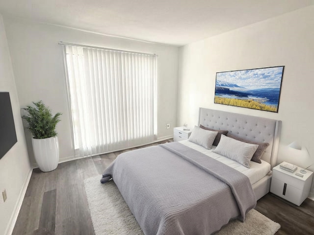 2824 S Bartell Dr, Houston, TX 77054 - bedroom featuring wood finished floors and baseboards
