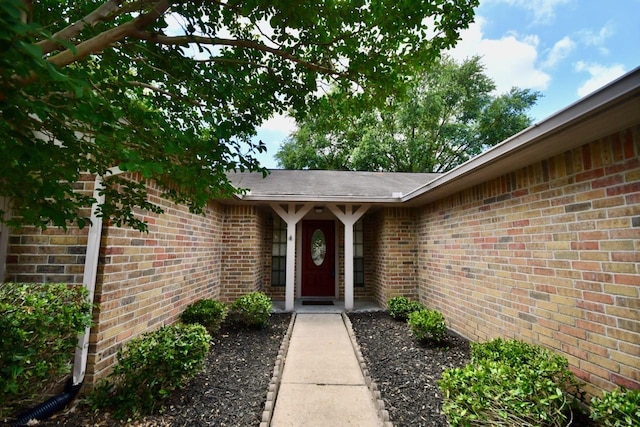 18723 Clover Gln, Katy, TX 77084 - view of exterior entry featuring brick siding