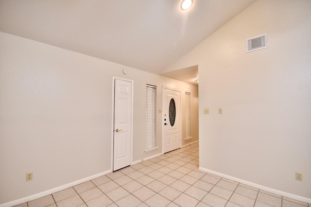 18723 Clover Gln, Katy, TX 77084 - unfurnished room featuring lofted ceiling and light tile patterned floors
