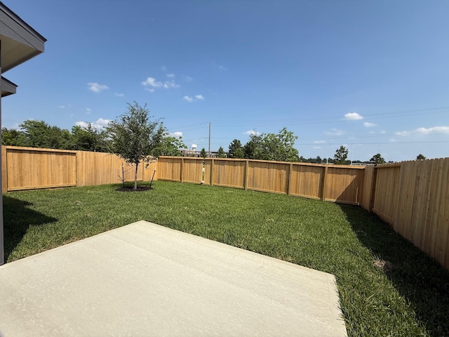 2572 Hawks Eye Dr, Conroe, TX 77301 - fenced backyard featuring a patio area