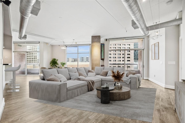 1901 Post Oak Blvd Unit 609, Houston, TX 77056 - living room with wood finished floors