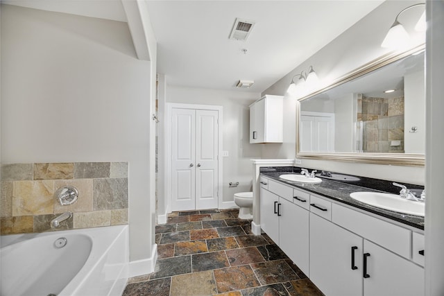 1901 Post Oak Blvd Unit 609, Houston, TX 77056 - full bathroom with stone tile flooring, double vanity, a bath, and tiled shower