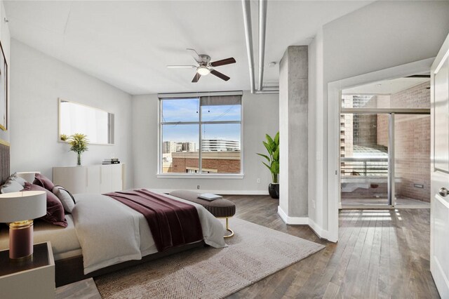 1901 Post Oak Blvd Unit 609, Houston, TX 77056 - bedroom featuring wood finished floors and ceiling fan