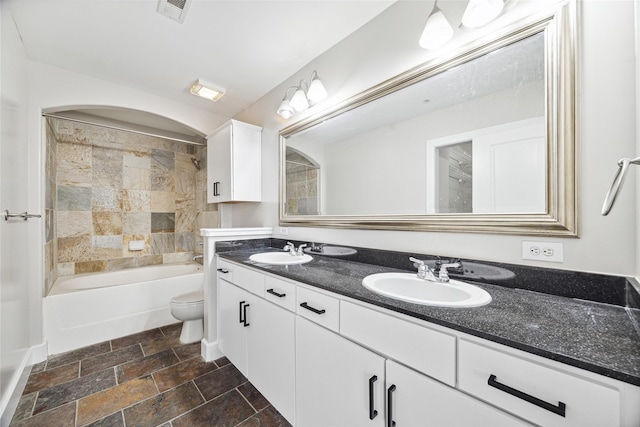 1901 Post Oak Blvd Unit 609, Houston, TX 77056 - full bath with double vanity, washtub / shower combination, and stone finish floors