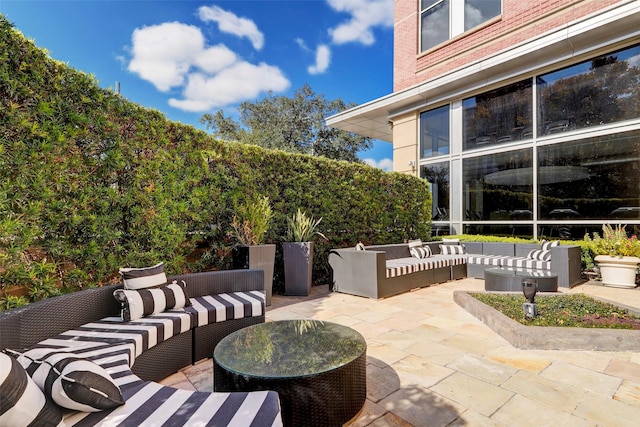 1901 Post Oak Blvd Unit 609, Houston, TX 77056 - view of patio / terrace with an outdoor living space