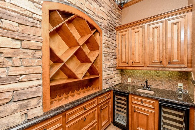 42 Lake Sterling Gate Dr, Spring, TX 77379 - wine area featuring beverage cooler and bar with sink