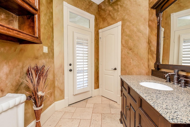 42 Lake Sterling Gate Dr, Spring, TX 77379 - bathroom featuring stone tile floors and vanity